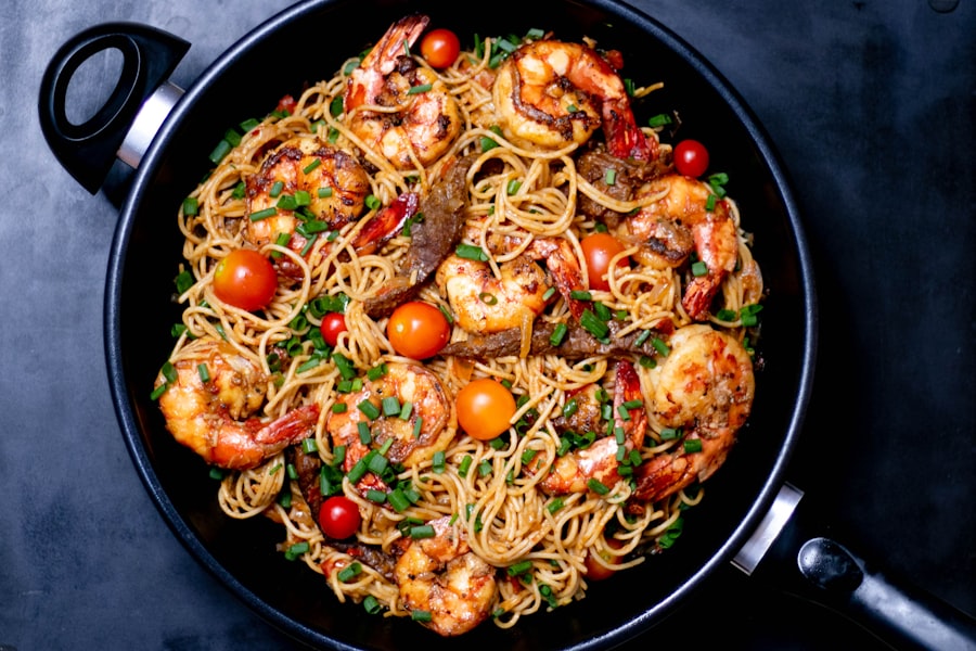 Spaghetti with prawns, chilli and tomato